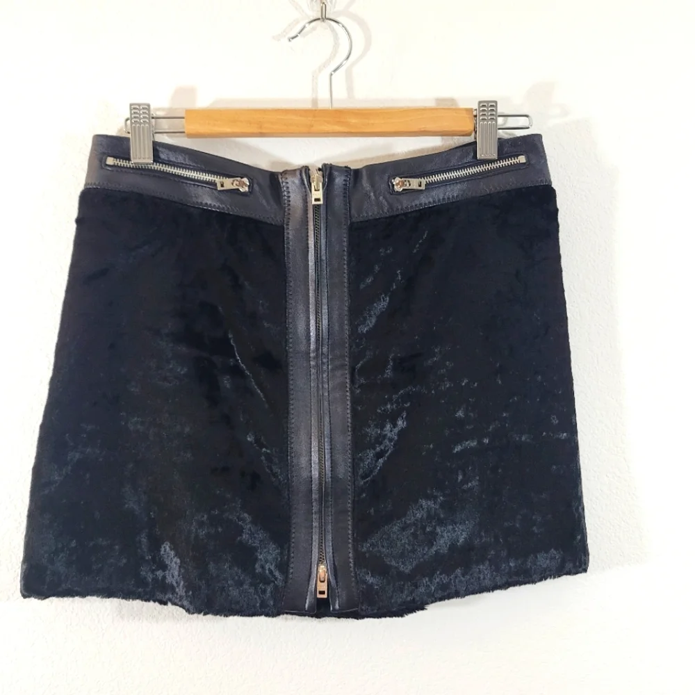 BEBE black soft faux fur genuine leather zip front gothic punk edgy mini skirt